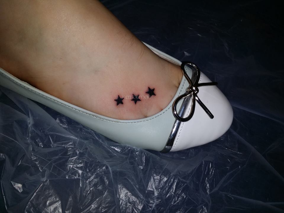 foot stars tattoo
